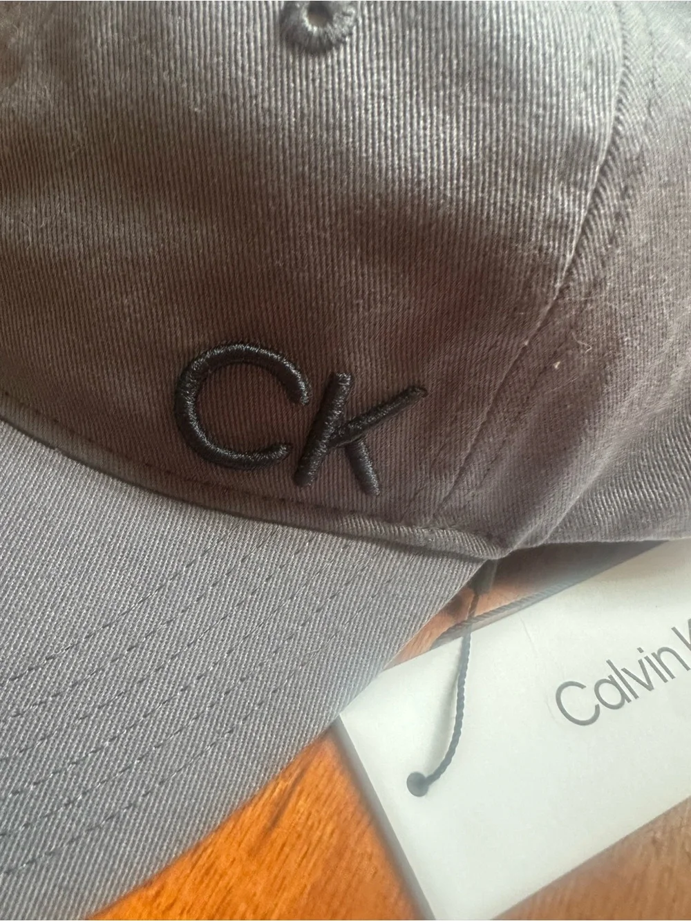 Calvin Klein women baseball cap grey With Blue accents inside logo